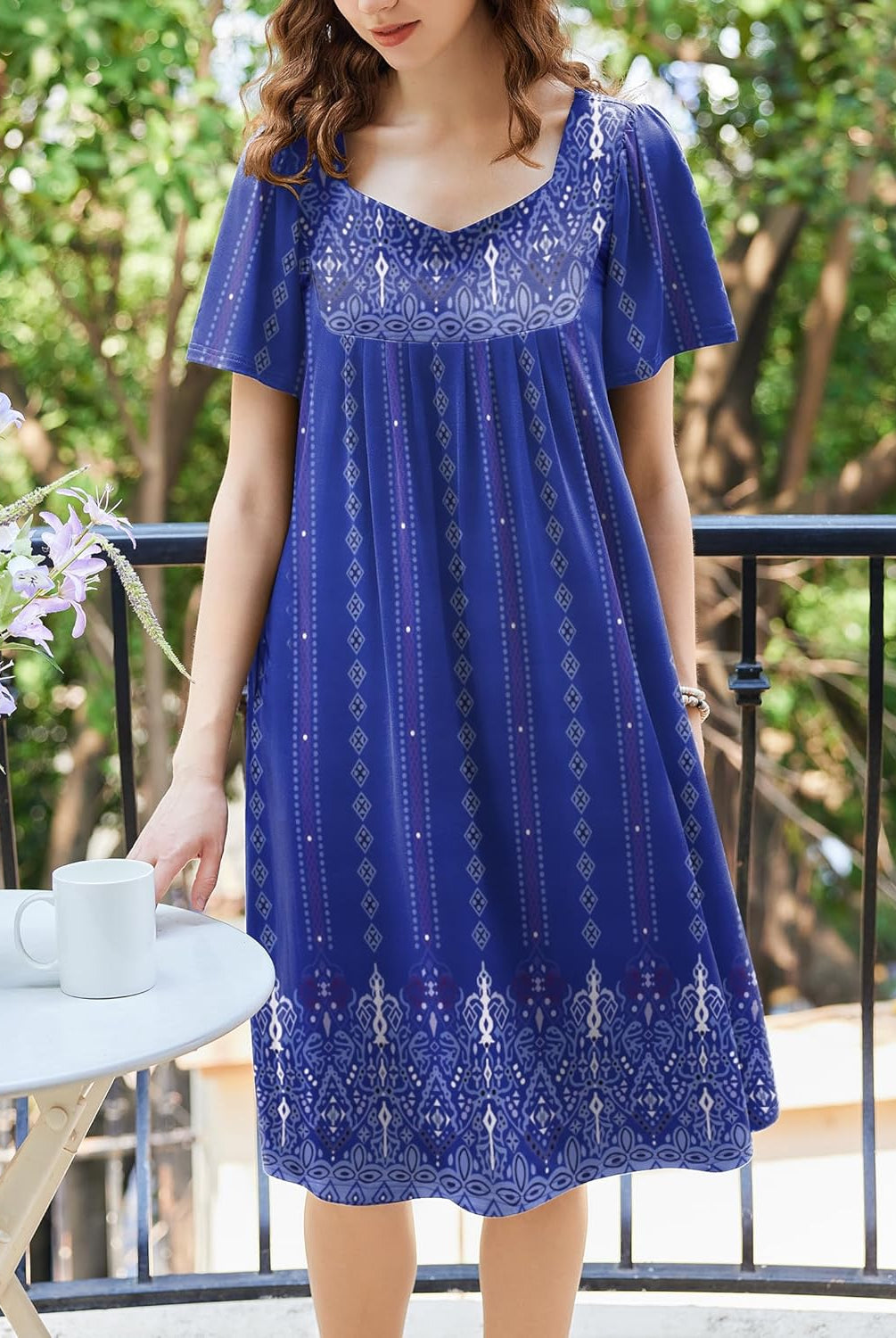 Women’s house dress, blue with white patterned print, gathered neckline, short sleeves