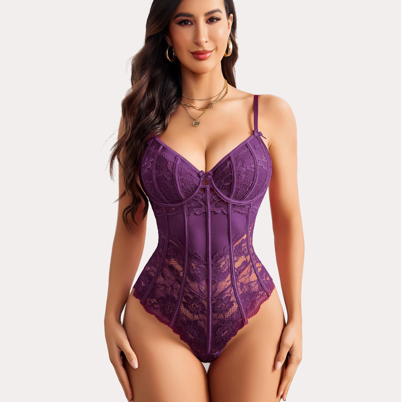 Purple lace bodysuit with underwire, V-neck, and bow detail. Stylish, chic women's lingerie.