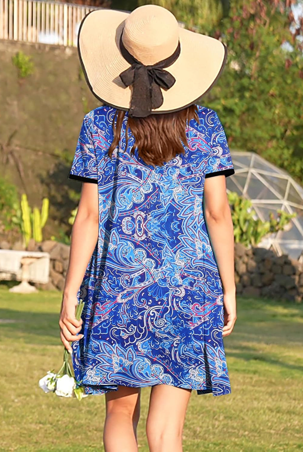Zipper front house coat robe, short sleeves, blue patterned print, back view.