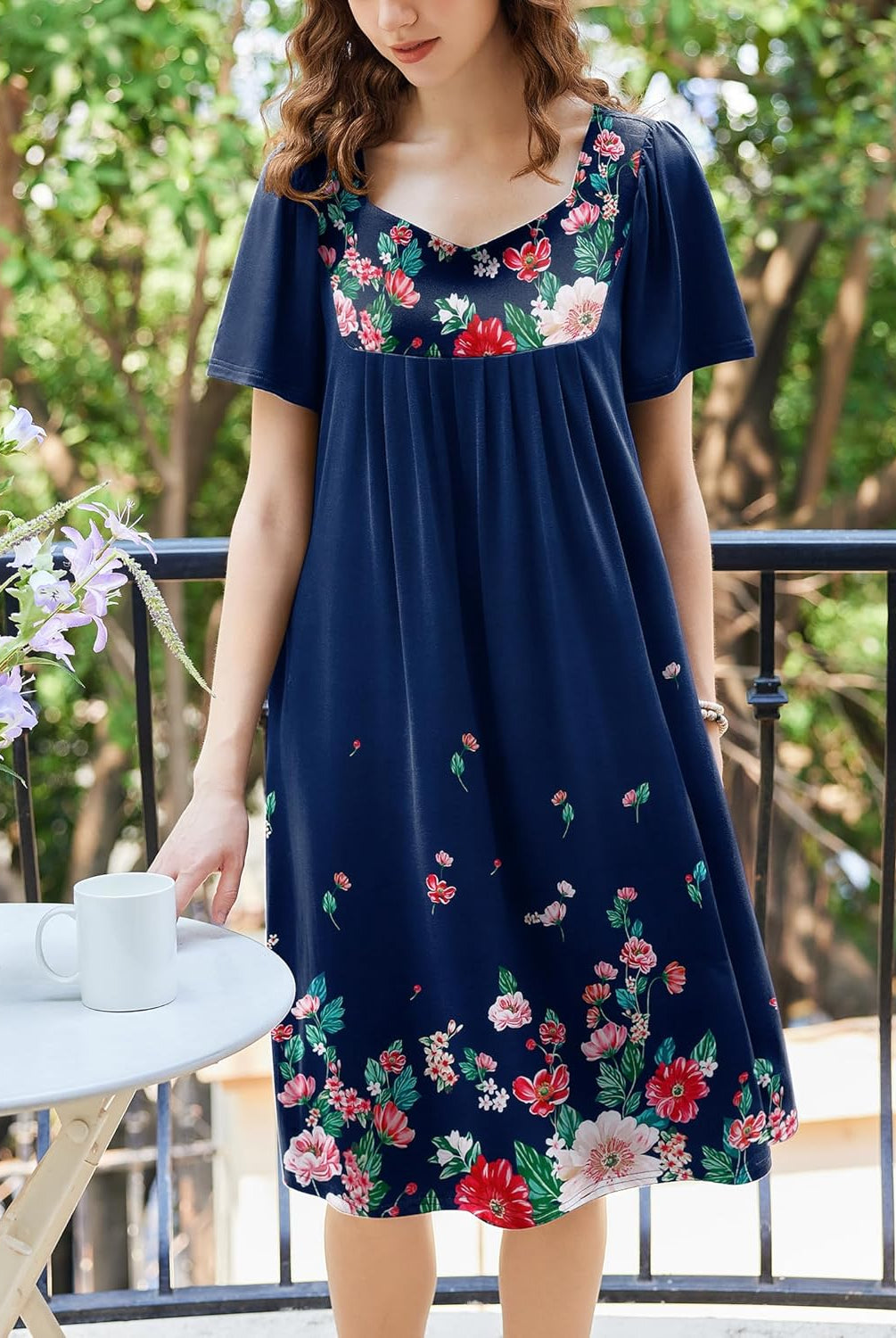 Navy floral house dress with scoop neckline and short sleeves, gathered skirt