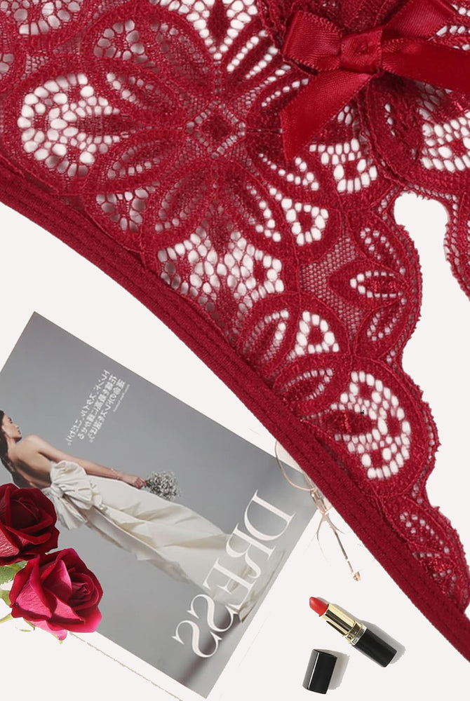 Red floral lace briefs with bow detail. Sexy low-rise design. Featuring Avidlove lingerie.