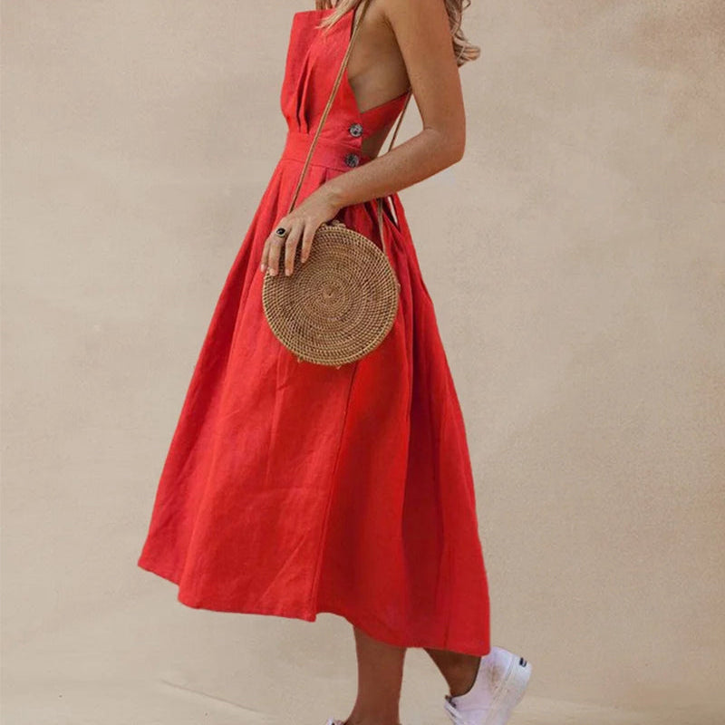 Red strap button waist pleated dress made of cotton and polyester, perfect for vacation