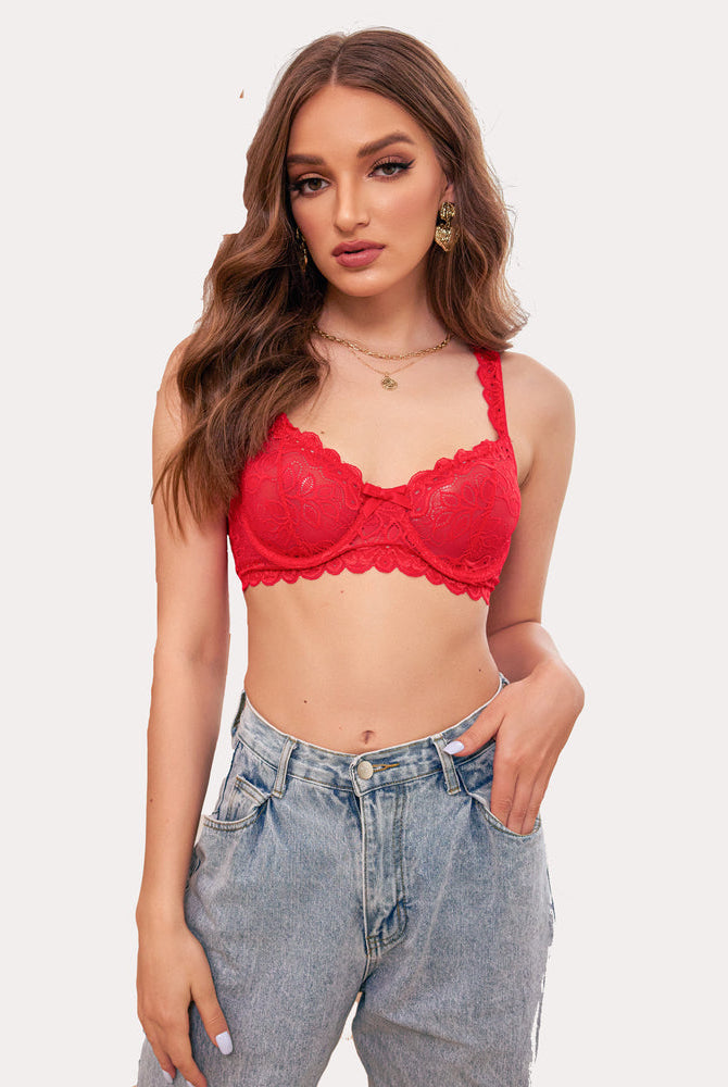 Red lace bra lingerie set with jeans. Sexy and elegant women's lingerie, designed for confidence.