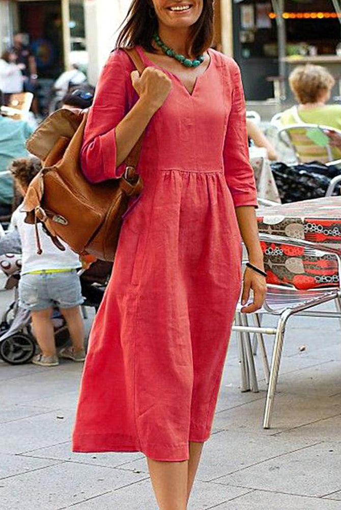 Coral cotton linen beach dress with V-neck and 3/4 sleeves, perfect for vacation style