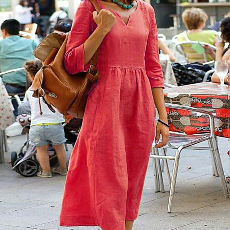 Coral cotton linen beach dress with V-neck and 3/4 sleeves, perfect for vacation style