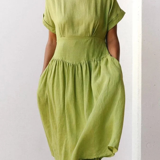 Linen Grass Green Midi Dress. Short-sleeved vacation dress with pockets. 55% cotton, 45% linen.