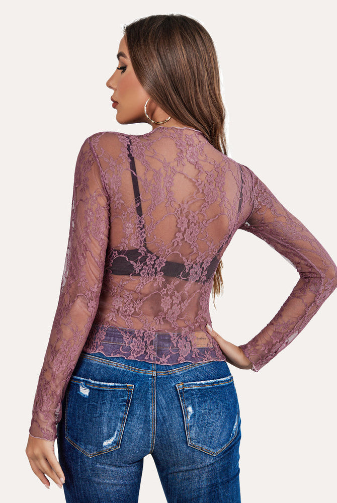 Mauve floral lace sheer blouse with mock neck and long sleeves. See-through mesh top.