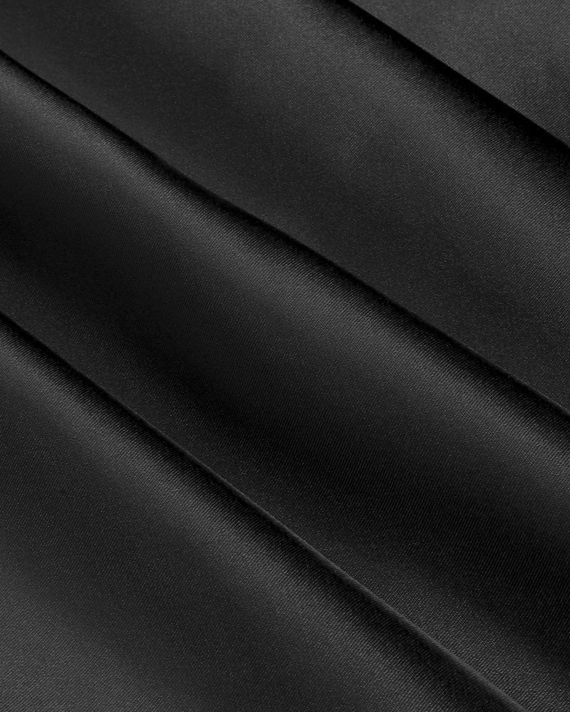 Black satin fabric detail. Ultra-soft, shiny material for a chemise slip nightgown
