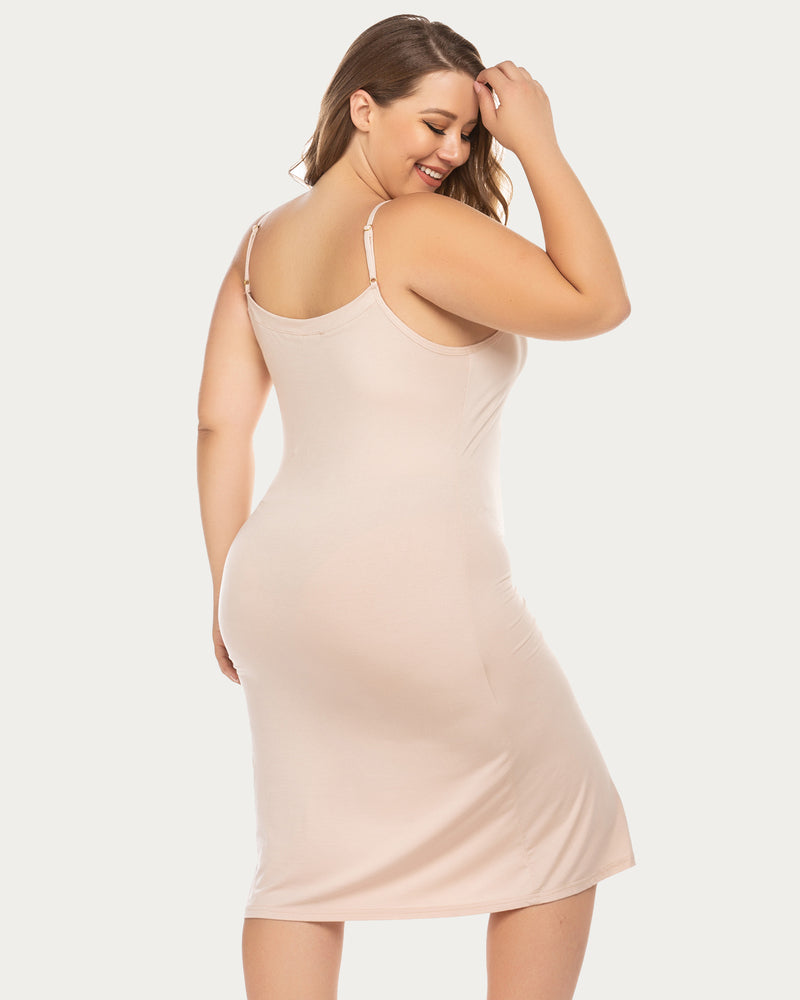 Plus Size nude chemise nightgown with adjustable straps and knee-length, enhancing figure.