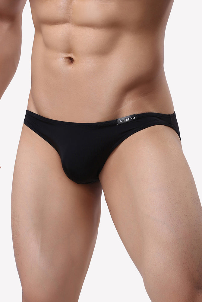Men's low-rise stretch briefs, black, side view