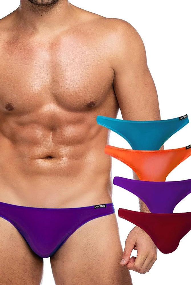 Men's low-rise briefs on model in purple and blue; green, orange pairs shown