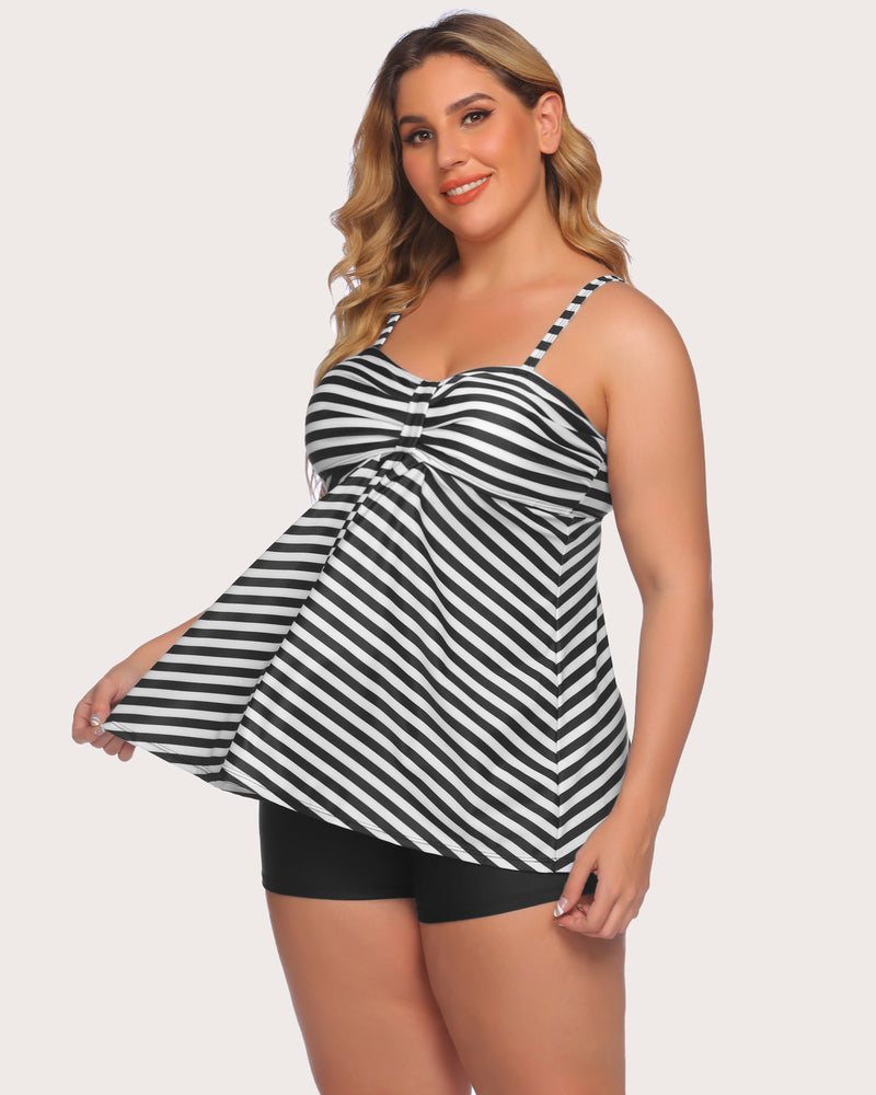 Black and white striped tankini swimsuit with adjustable straps and swim shorts.