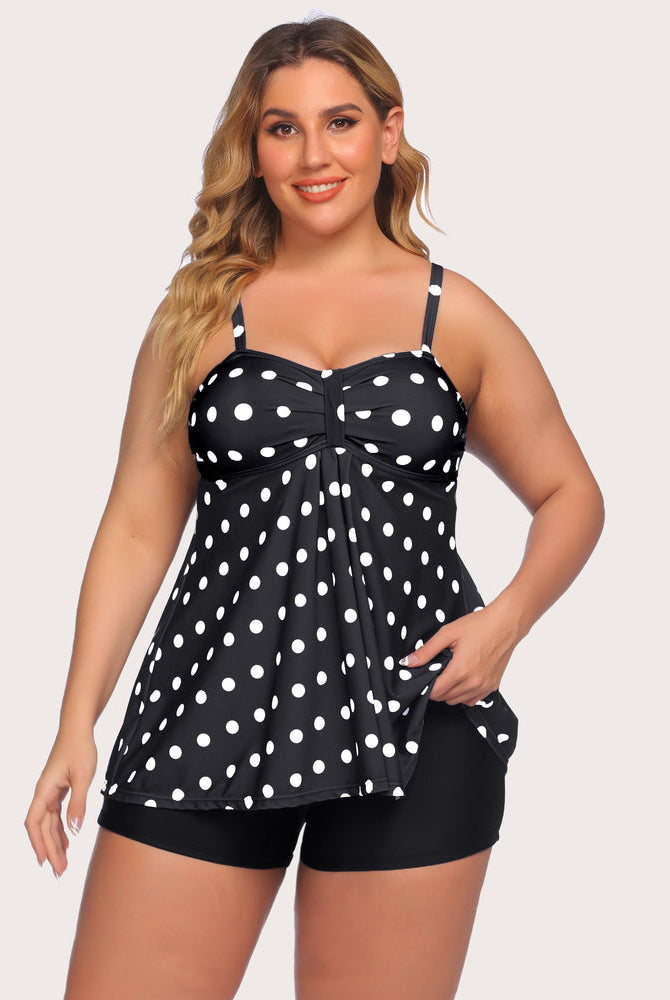 Polka dot tankini swimsuit for women, adjustable straps and black swim shorts. Stylish swimwear.