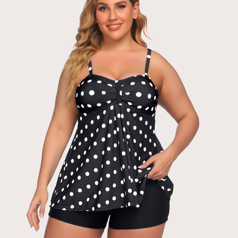 Polka dot tankini with adjustable straps. Sun-protective, retro style, perfect for beach confidence.