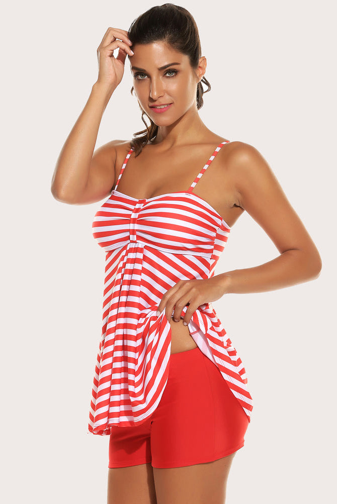 Red striped tankini set with adjustable straps and red shorts. Retro swimwear for sun protection.