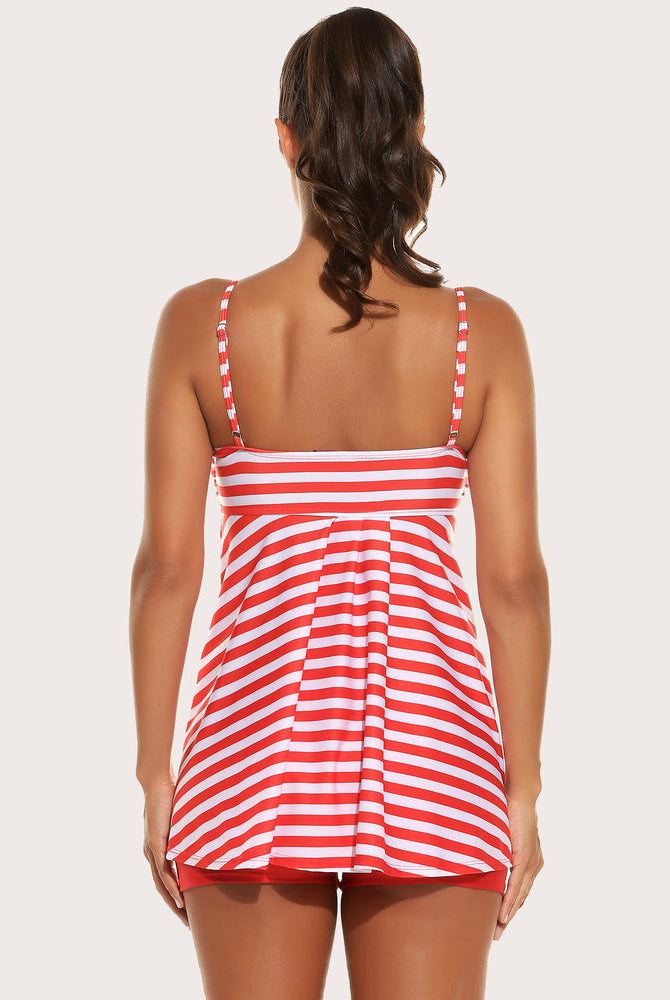 Red and white striped tankini swimsuit with shorts, adjustable straps, and sun-protective swimwear.
