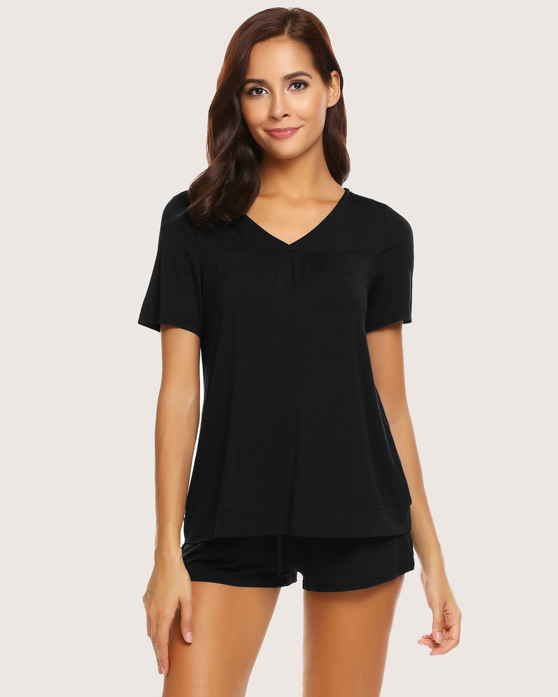 Black short pajama set for women. Soft rayon and spandex blend, comfortable sleepwear.