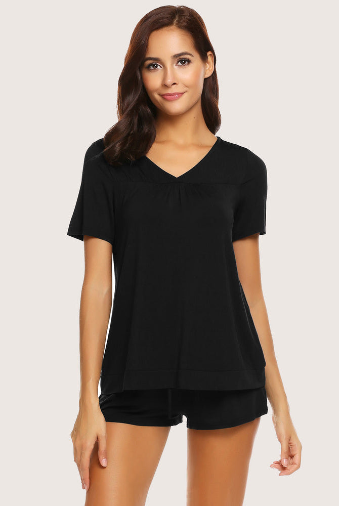 Black V-neck shorts pajama set for women. Soft and comfortable rayon sleepwear for casual wear.