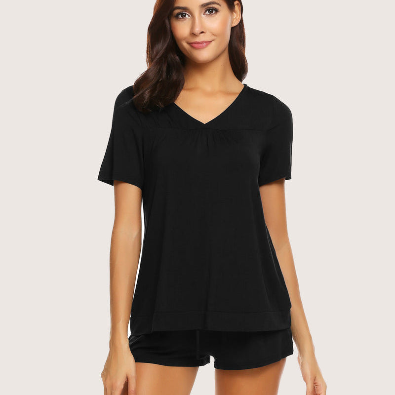Black V-neck shorts pajama set for women. Soft and comfortable rayon sleepwear for casual wear.