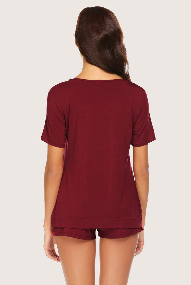 Burgundy rayon shorts pajama set for women. Comfortable sleepwear featuring a V-neck top and shorts