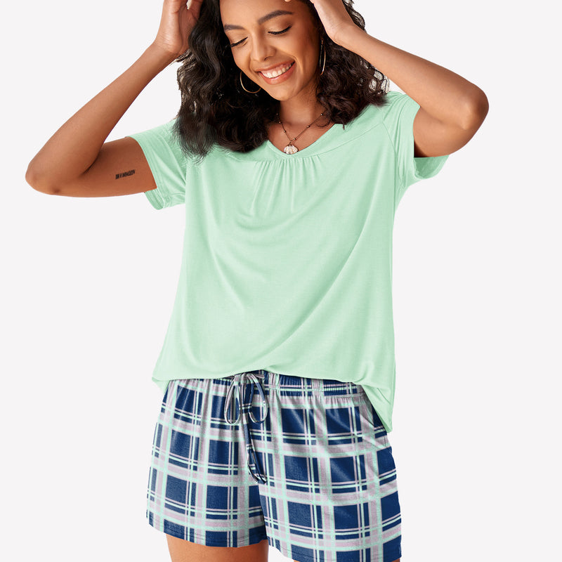 Women's mint green pajama set with plaid shorts. Comfortable, breathable sleepwear for women.