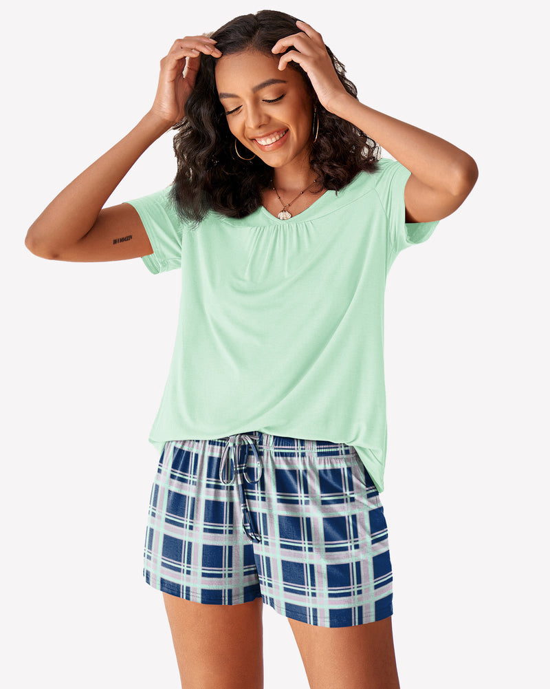 Women's mint green pajama set with plaid shorts. Comfortable, breathable sleepwear for women.