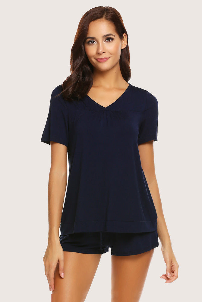 Navy blue V-neck rayon shorts pajama set for women. Comfortable and soft sleepwear for casual wear.