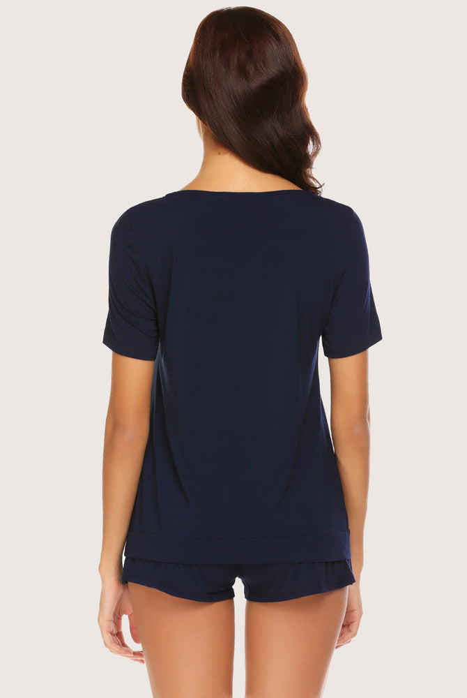 Navy blue V-neck rayon shorts pajama set for women. Comfortable sleepwear, soft fabric.