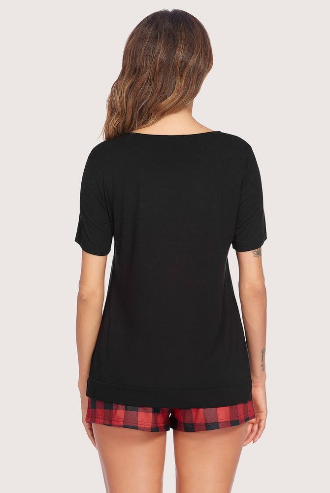 Black short sleeve pajama set with red checkered shorts, soft and breathable women's loungewear.