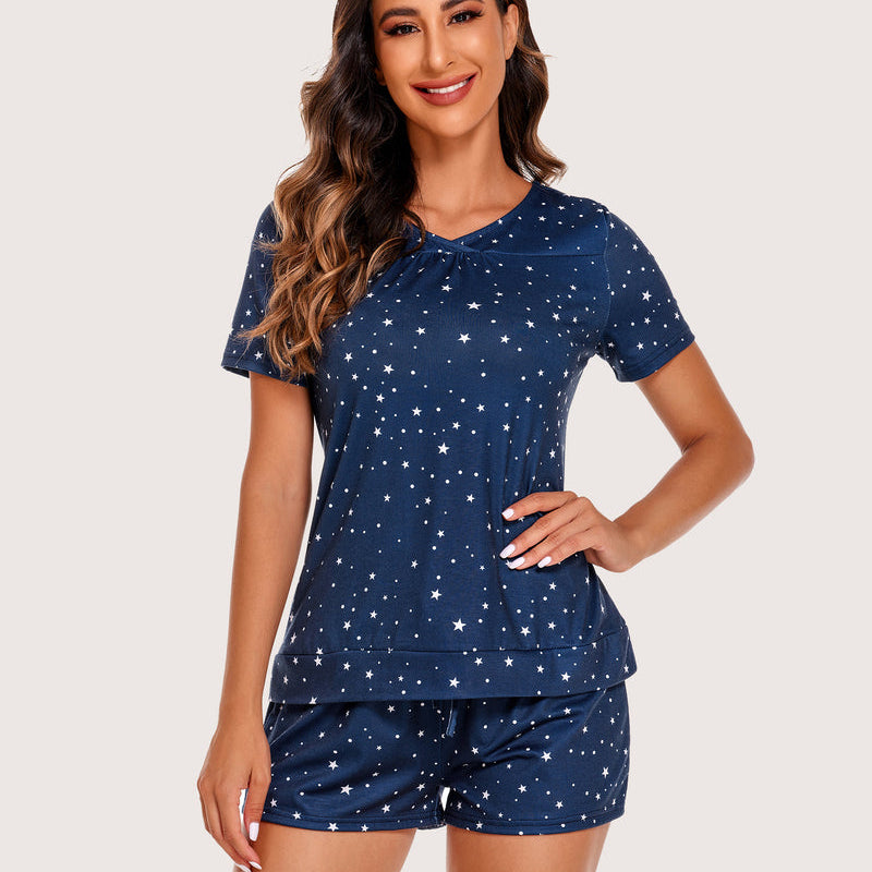 Navy blue star print shorts pajama set for women. Comfortable rayon sleepwear with V-neck top.