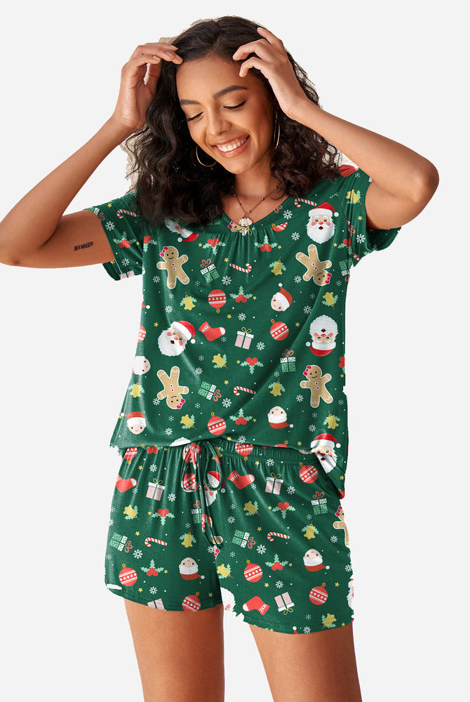 Green Christmas pajama set. Soft rayon blend, comfortable women's sleepwear with festive print.