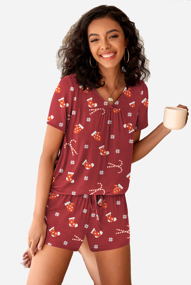 Women's burgundy Christmas pajama set with festive print, rayon blend, comfortable sleepwear.