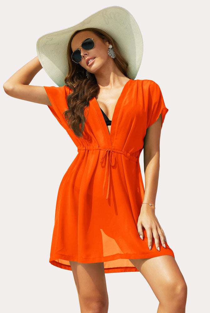Orange chiffon swimsuit cover-up, deep V-neck and drawstring waist. A summer beach essential.