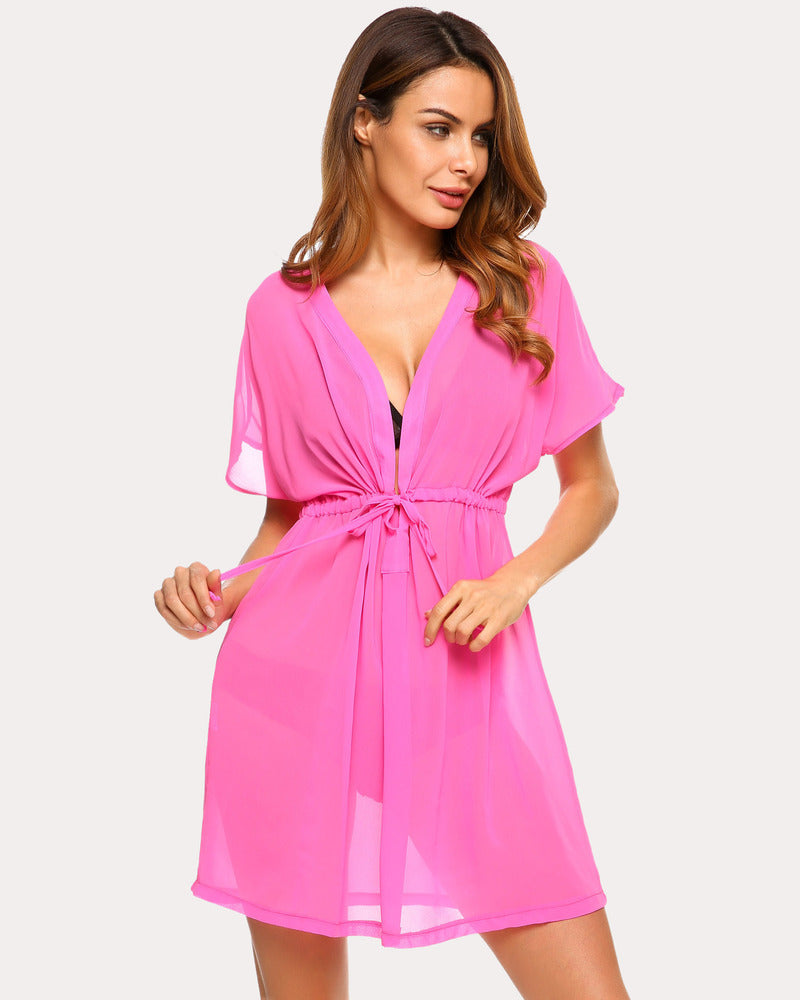 Pink chiffon cover-up. Deep V-neck and drawstring waist. Lightweight summer beach essential.