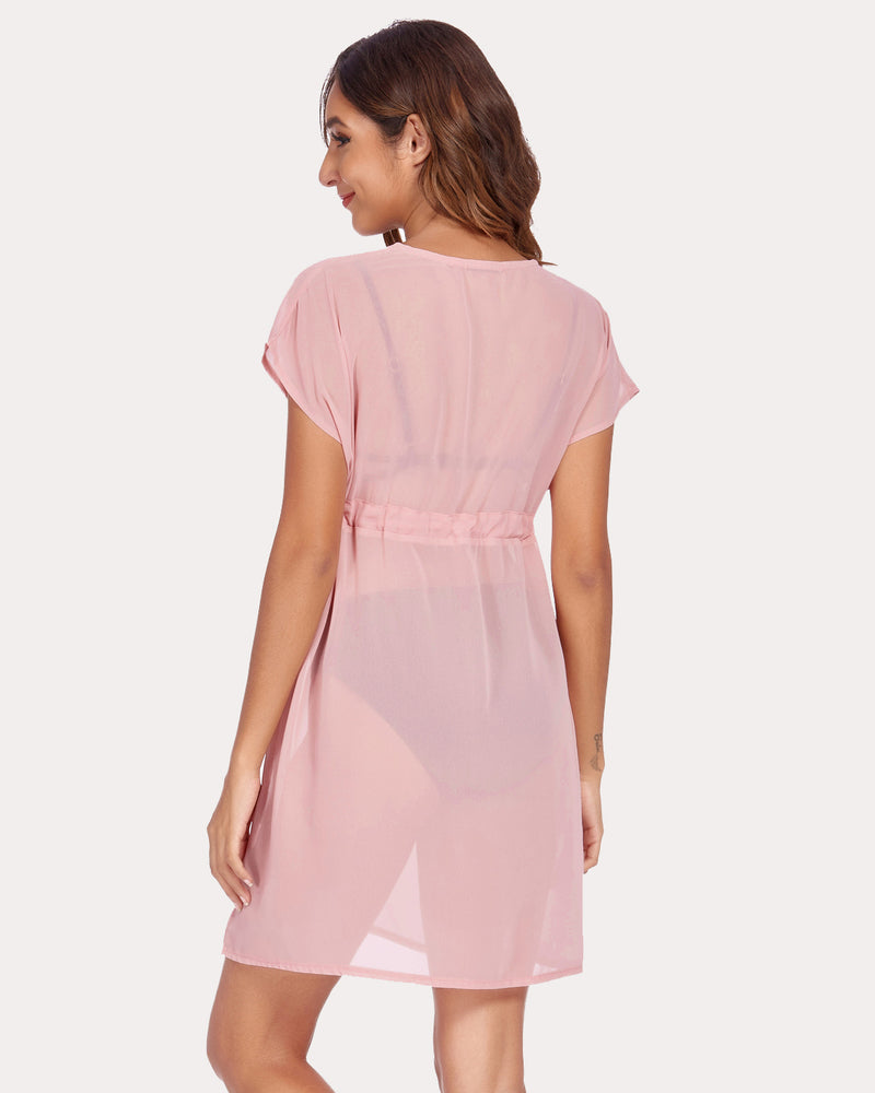 Light pink chiffon swimsuit cover-up with deep V-neck and drawstring waist. Summer beach essential.
