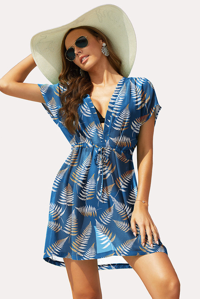 Leaf print chiffon swimsuit cover-up. Deep V-neck and drawstring waist, a summer essential.