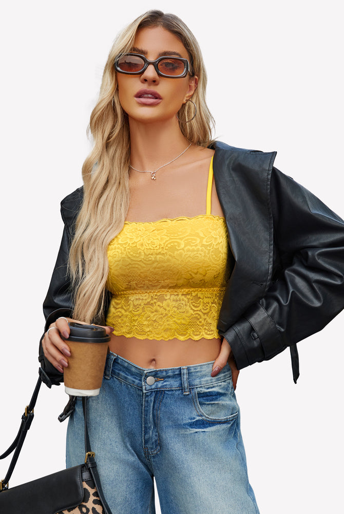 Yellow lace bralette with blue jeans, leather jacket and sunglasses. Sexy lingerie style.