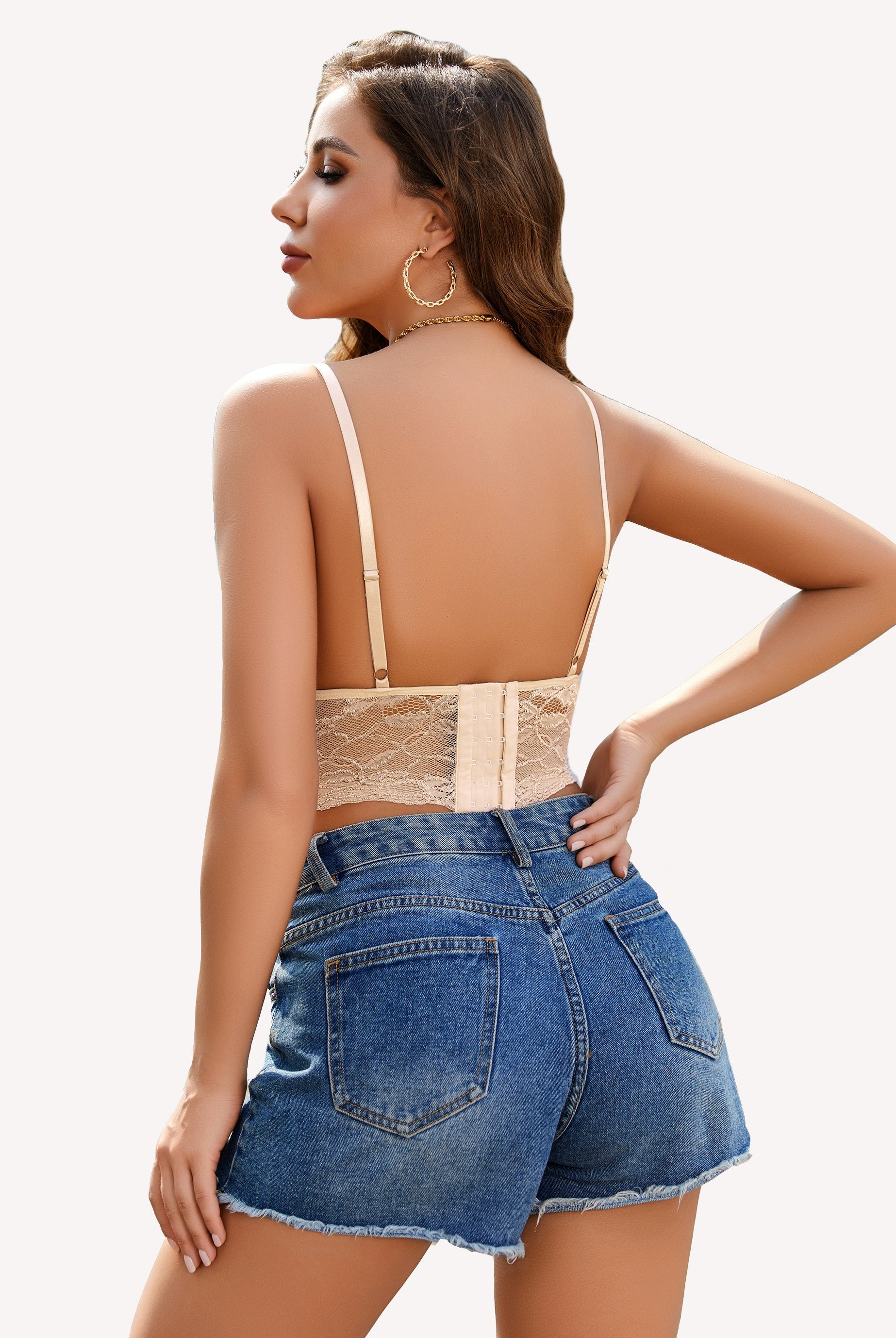 Beige lace bralette with adjustable straps and denim shorts. A pretty and charming style.