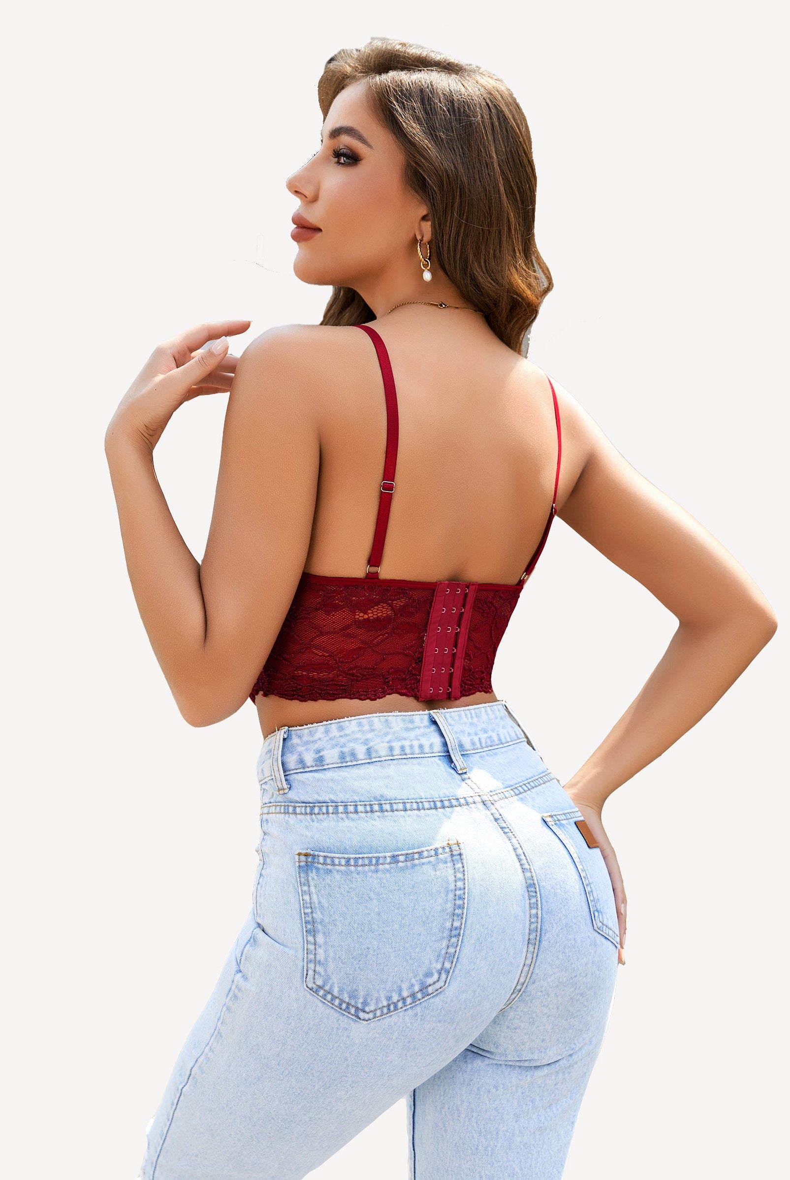 Burgundy lace crop top with adjustable straps and denim jeans. Stylish lingerie from Avidlove.