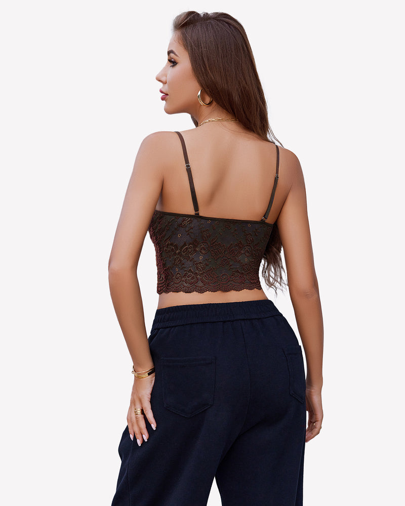 Brown lace bralette with floral trim, spaghetti straps. Sexy lingerie and dark blue pants.