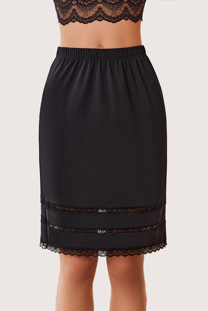Black knee length half slip with floral lace trim and elastic waistband. Comfortable underskirt.