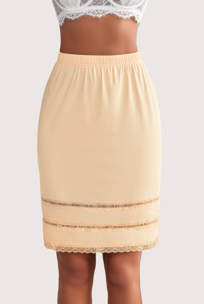 Knee-length beige half slip with lace trim and elastic waist, perfect for dresses.