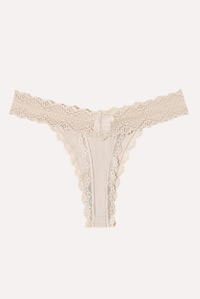 Beige lace waist thong panties with ribbed fabric and bow detail. Sexy Avidlove lingerie
