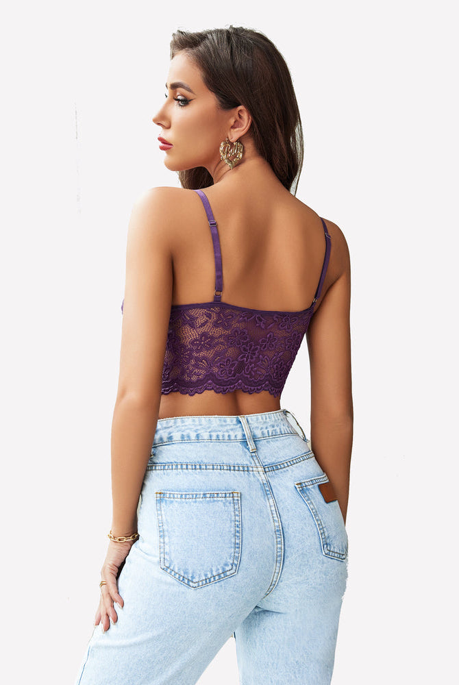 Purple floral lace bralette crop top with adjustable straps and jeans. Sexy lingerie for women.