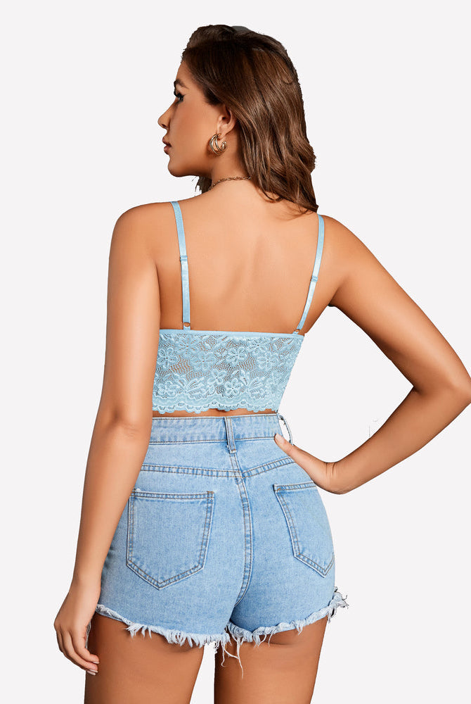 Light blue lace bralette paired with denim shorts. Sexy and stylish.