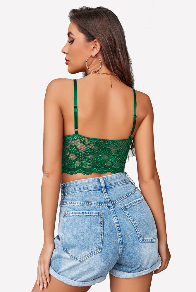 Green lace bralette crop top with adjustable straps and denim shorts. Sexy lingerie for women.