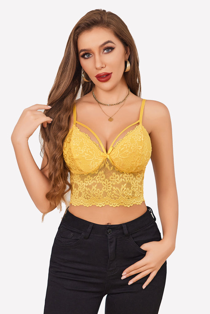 Yellow lace bralette crop top with adjustable straps & black jeans. Sexy lingerie for women.