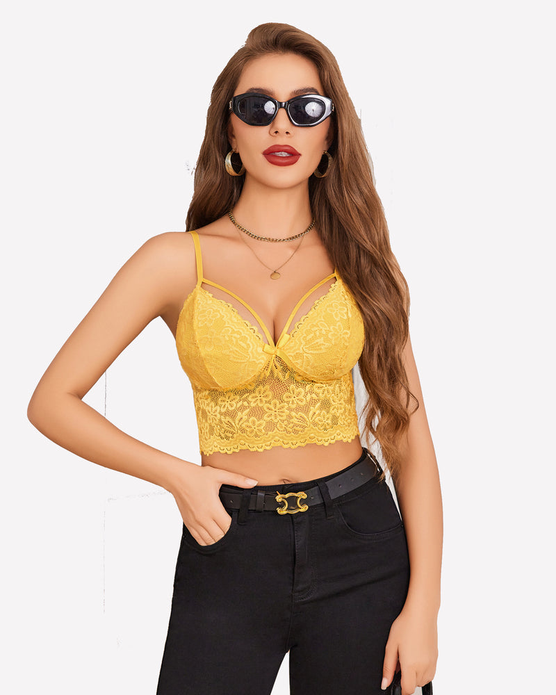 Yellow lace bralette crop top with adjustable straps. Sexy lingerie and black jeans outfit.