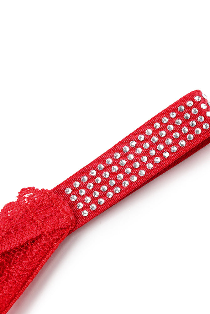 Red lace thong strap with rhinestone embellishments. Sexy lingerie with transparent lace.