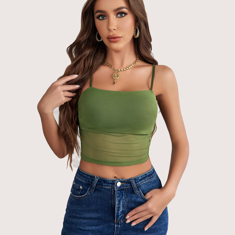 Green mesh tank top with spaghetti straps, showcasing a flattering layered design on a model.